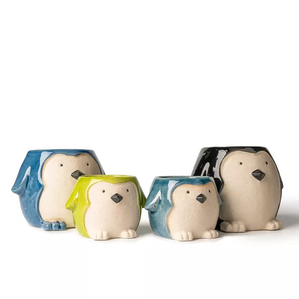 Pinqvin şəkilli keramika şam sahibləri Pinqvin şəkilli keramika şam sahibləri